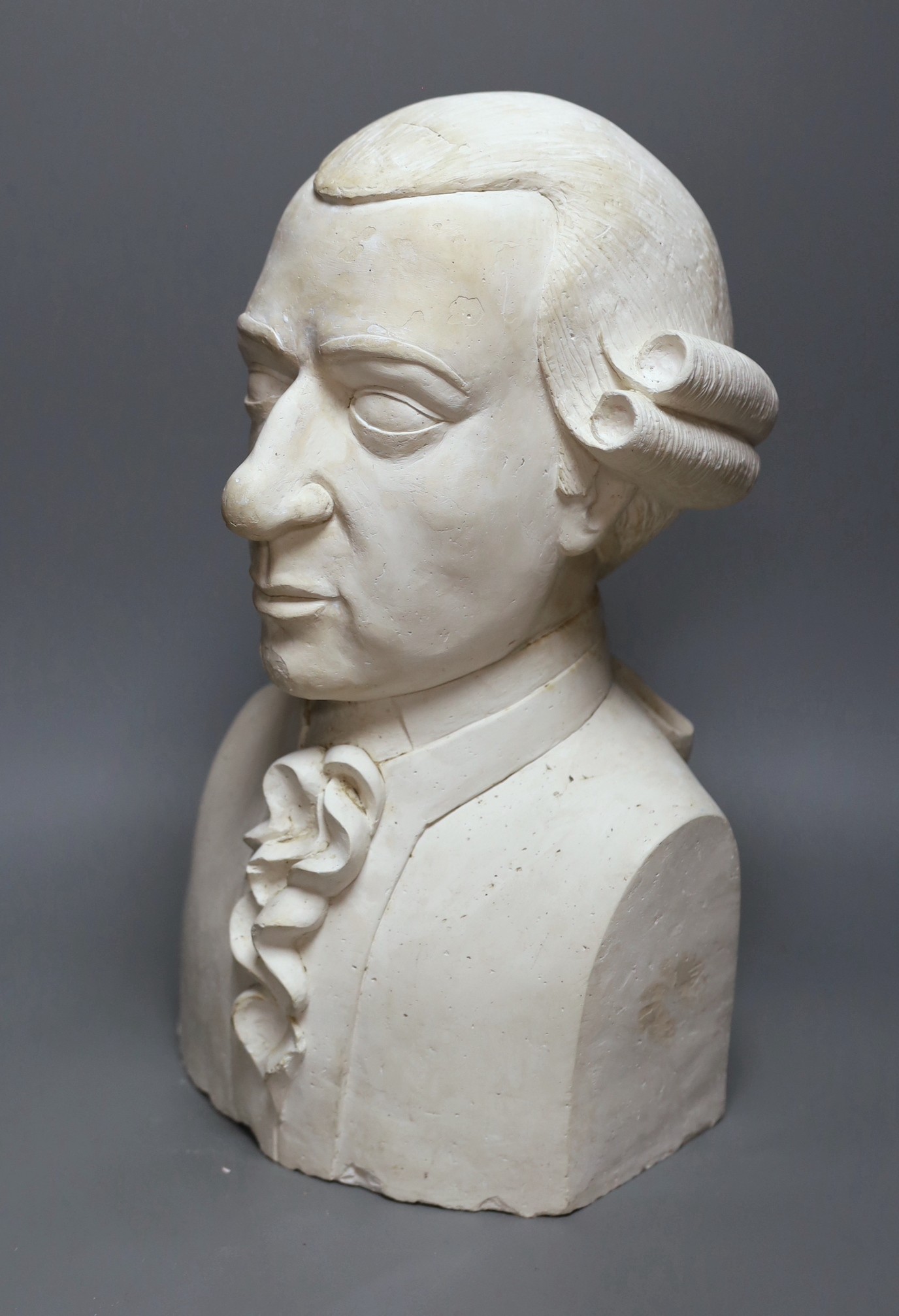A plaster portrait bust of an 18th century gentleman, 45cm